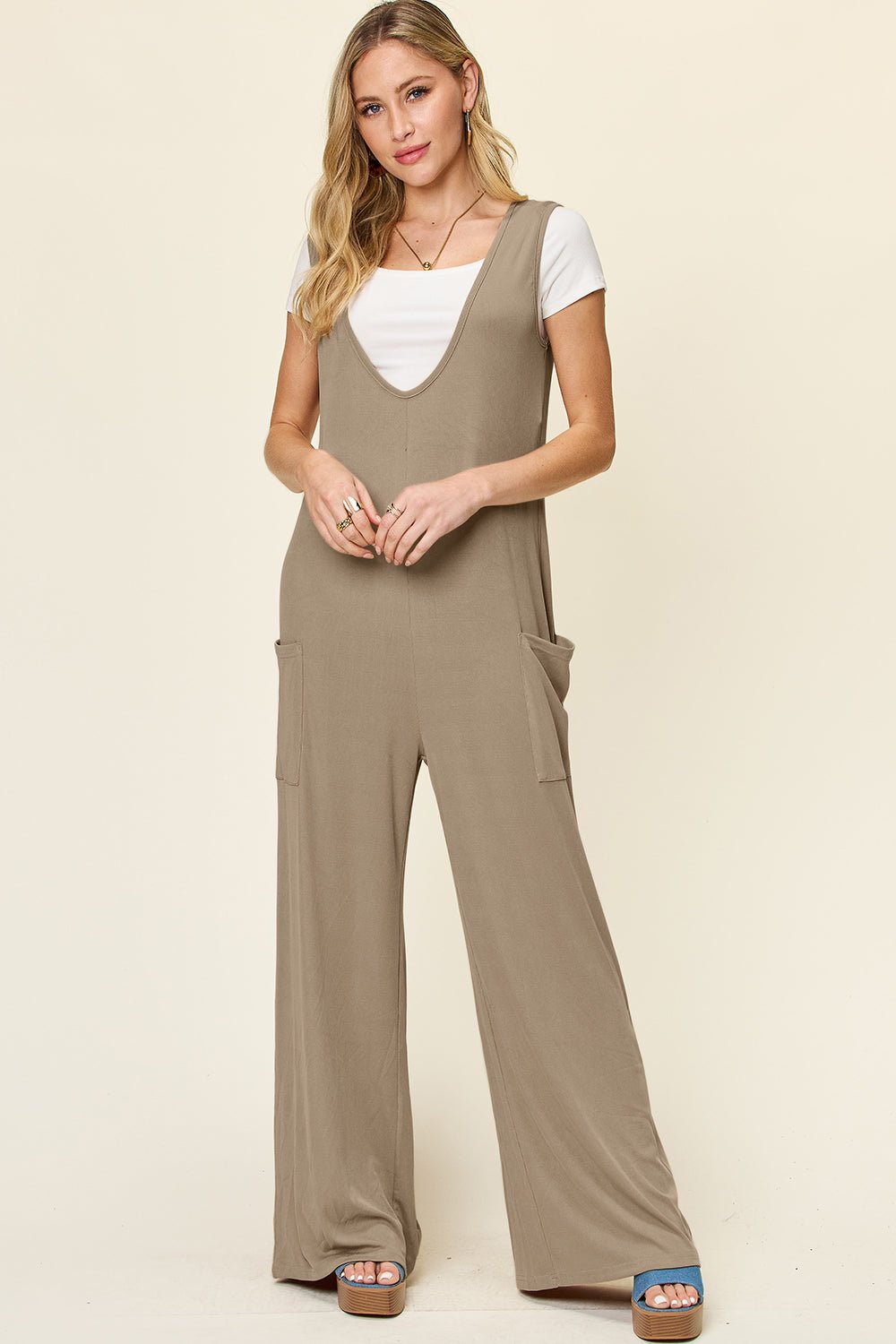 Double Take Full Size Sleeveless Wide Leg Jumpsuit with Pockets - GirlyBayJumpsuits & RompersDouble Take Full Size Sleeveless Wide Leg Jumpsuit with Pockets100100375754352SMochaGirlyBayDouble Take Full Size Sleeveless Wide Leg Jumpsuit with Pockets
