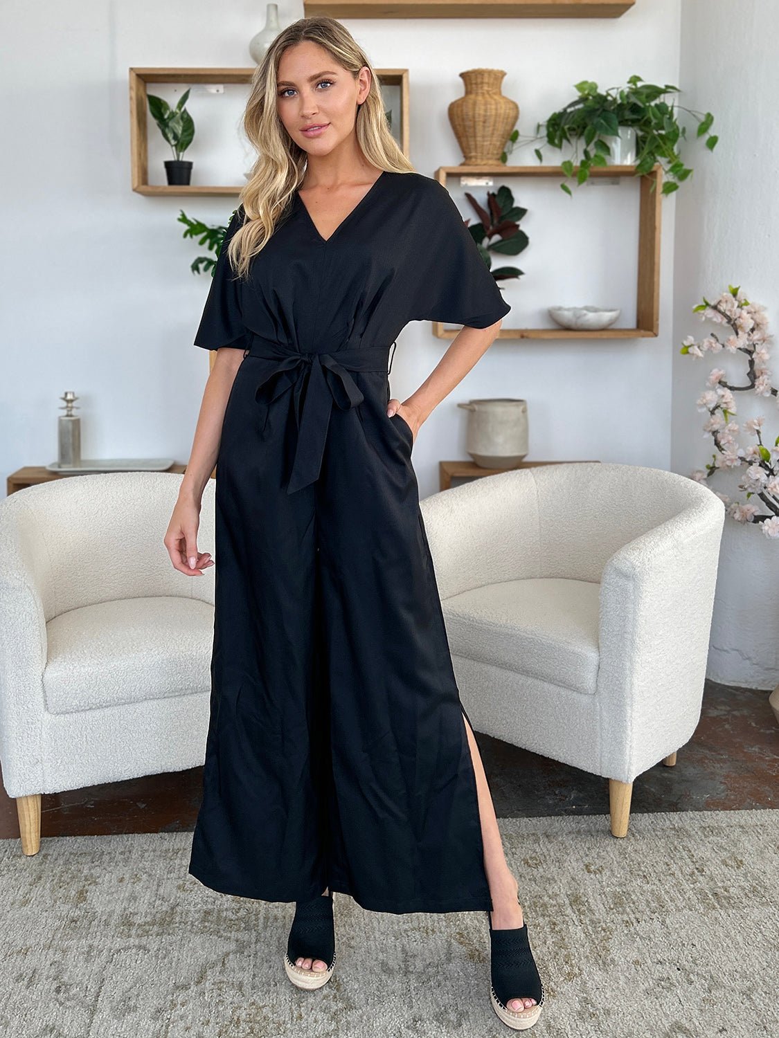 Double Take Full Size V - Neck Tied Side Slit Jumpsuit - GirlyBayJumpsuits & RompersDouble Take Full Size V - Neck Tied Side Slit Jumpsuit100100392071308SBlackGirlyBayDouble Take Full Size V - Neck Tied Side Slit Jumpsuit