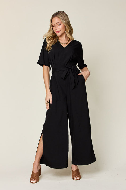 Double Take Full Size V - Neck Tied Side Slit Jumpsuit - GirlyBayJumpsuits & RompersDouble Take Full Size V - Neck Tied Side Slit Jumpsuit100100392071308SBlackGirlyBayDouble Take Full Size V - Neck Tied Side Slit Jumpsuit