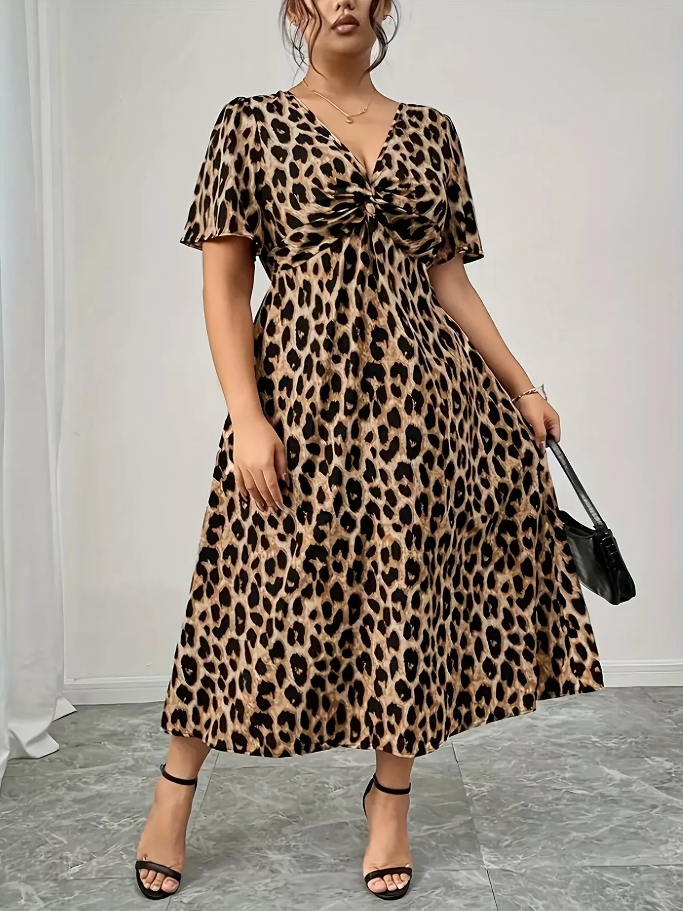 Plus Size Twisted Front Leopard Short Sleeve Dress - GirlyBayCasual Dresses47dda7368fed43849cd85cf5a9fd774b - Max - Origin1001001677987991XLLeopardGirlyBay47dda7368fed43849cd85cf5a9fd774b - Max - OriginPlus Size Twisted Front Leopard Short Sleeve DressCasual DressesGirlyBay100100167798799